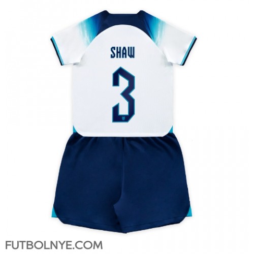 Camiseta Inglaterra Luke Shaw #3 Primera Equipación para niños Mundial 2022 manga corta (+ pantalones cortos)